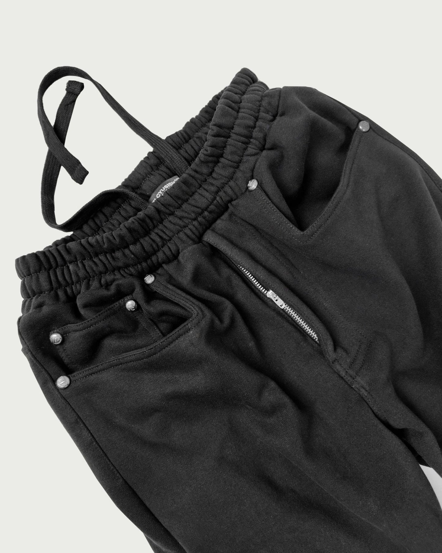 [ALCYUS] A25 RIVET SWEAT PANTS